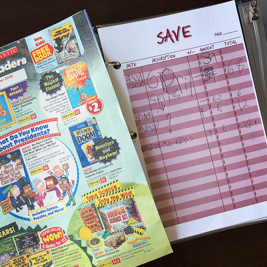 page from money management binder titled SAVE with child's writing next to school book fair order form